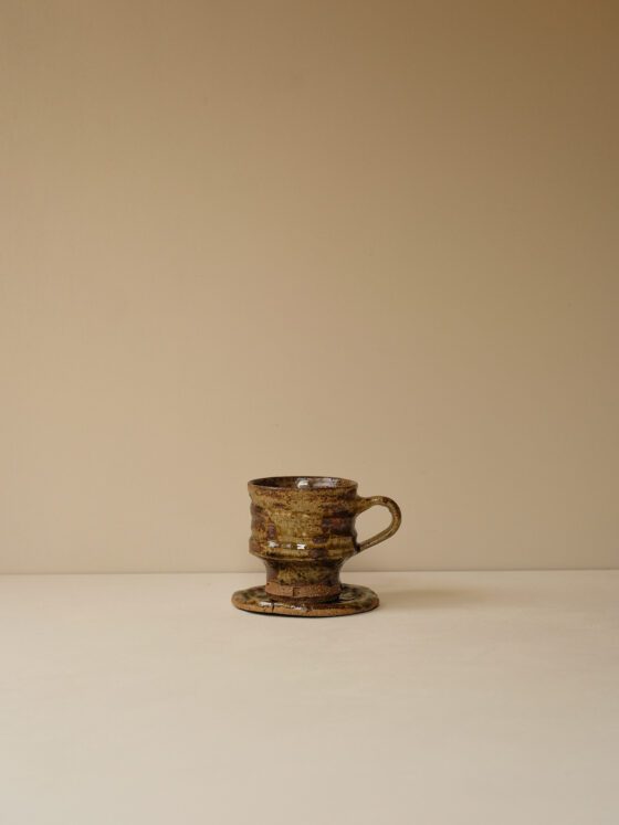 Mug and Saucer by Jake Fisk