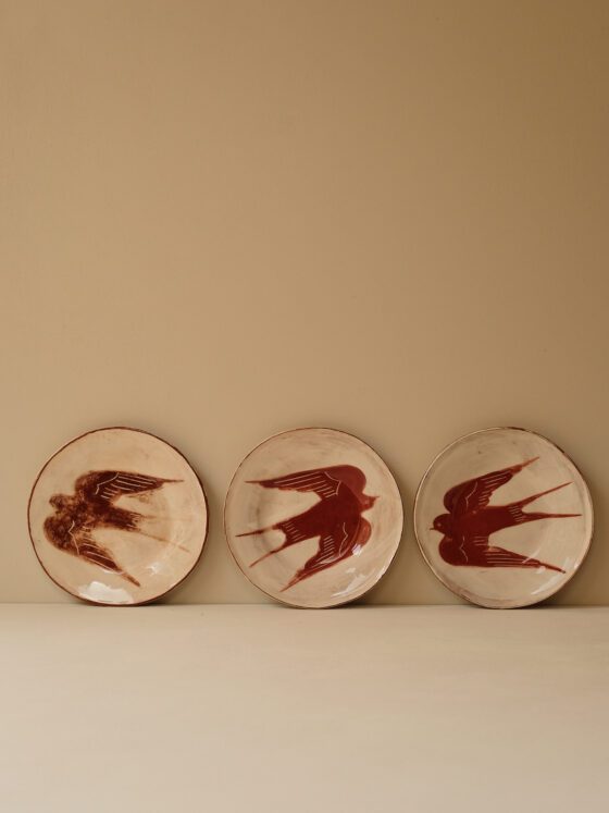 Terracotta and Slip Glazed Swallow Plates by Linzi West